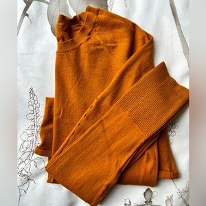 Lululemon wool blend, orange, scoop neck sweater in size 0.